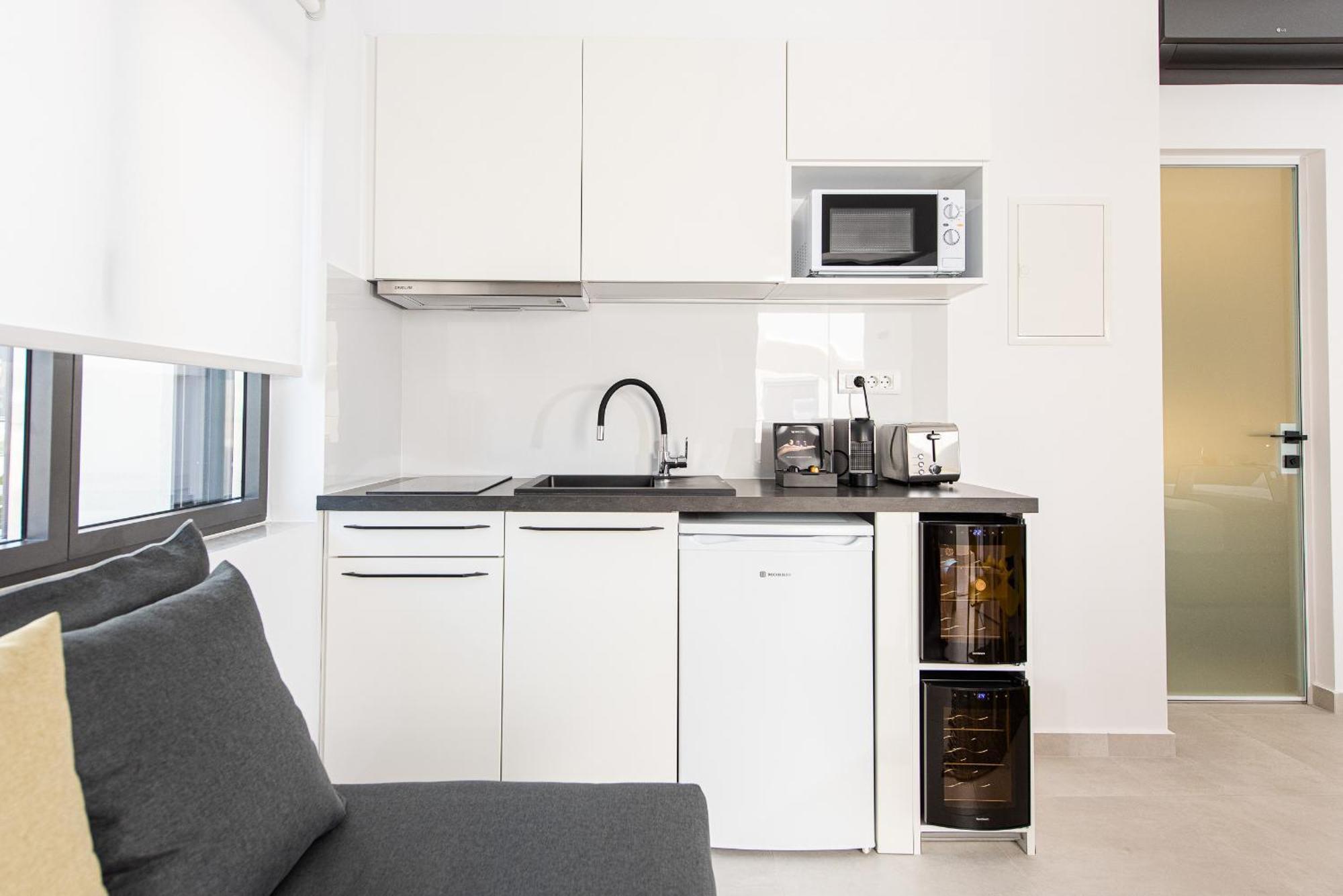 Cozy Corner Luxury Apartments Chrissi Akti Chania Quarto foto