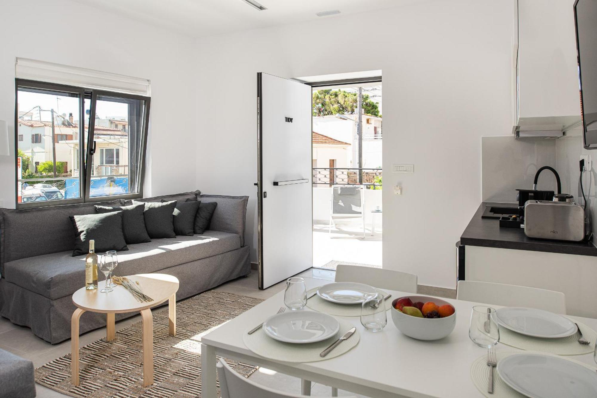 Cozy Corner Luxury Apartments Chrissi Akti Chania Quarto foto